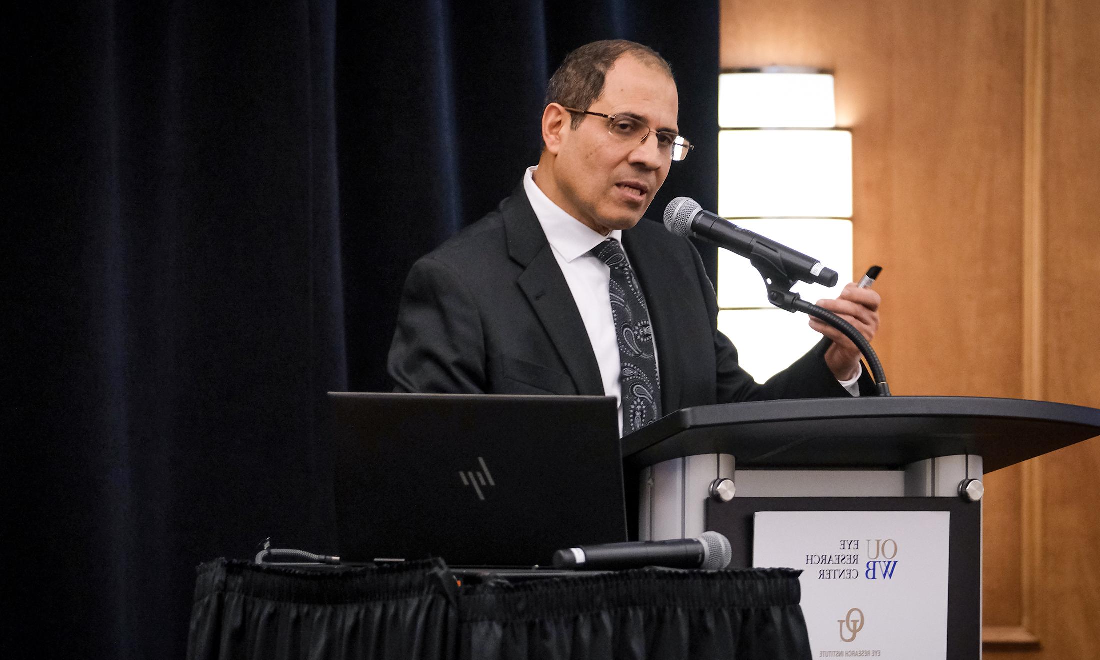 An image of Dr. Al-Shabrawey speaking at the event